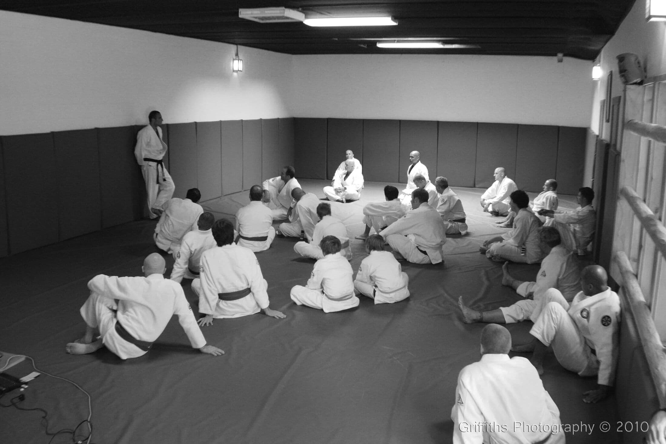 A full Gracie Combatives class practicing on the mat